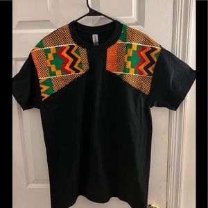 T-Shirt accented with Afrocentric fabric